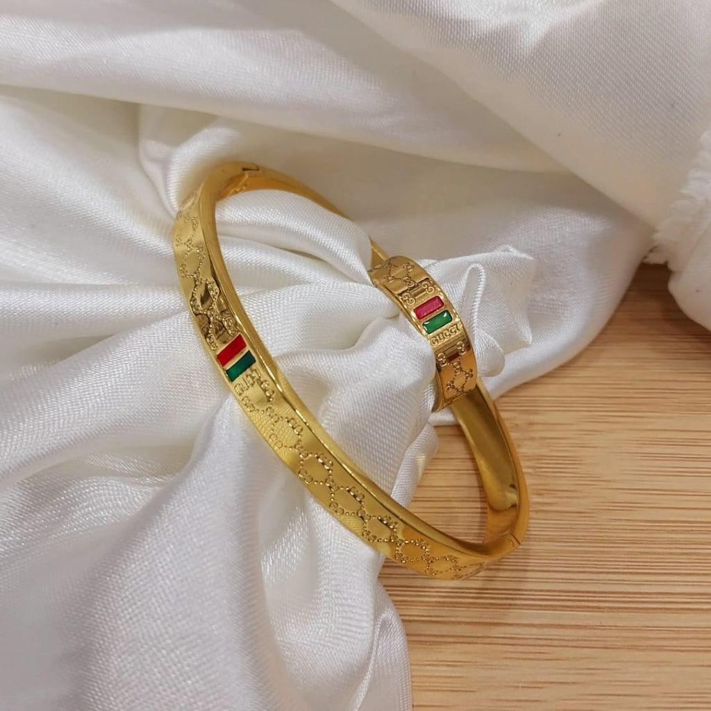 Gold Plated Stainless Steel Bangles And A Matching Ring Providing
