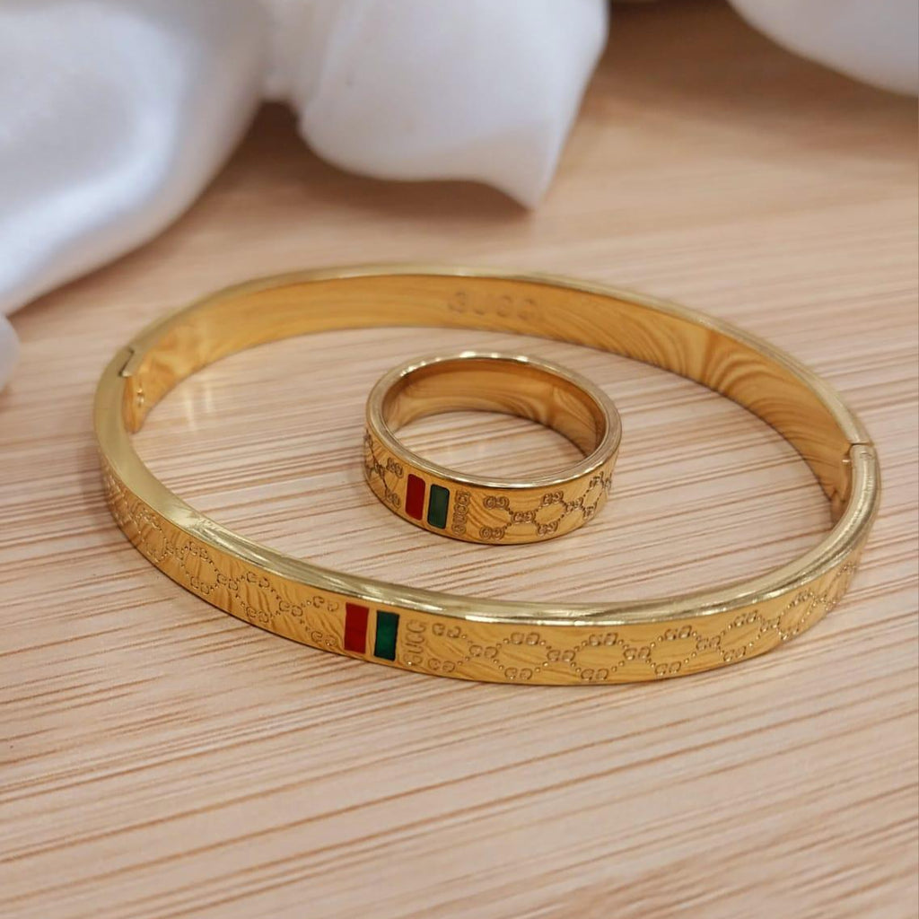 Gold Plated Stainless Steel Bangles And A Matching Ring Providing